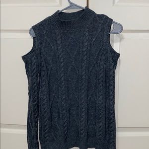 Sweater with shoulder openings